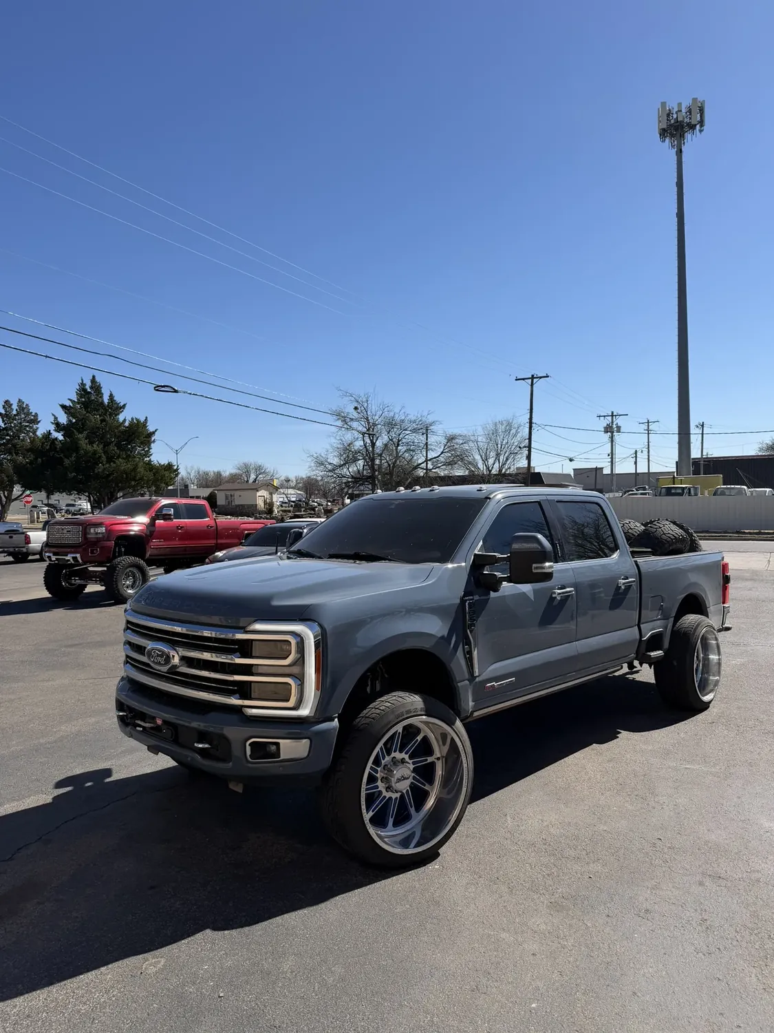 Forged wheel and tire package on a lifted truck built by RAW Concepts